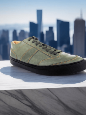 Step into style and comfort with our Track Leather Sneaker